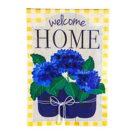 The Welcome Home Hydrangeas garden flag features vivid royal blue potted hydrangeas, a yellow checked border, and the words "Welcome Home" across the top of the flag.