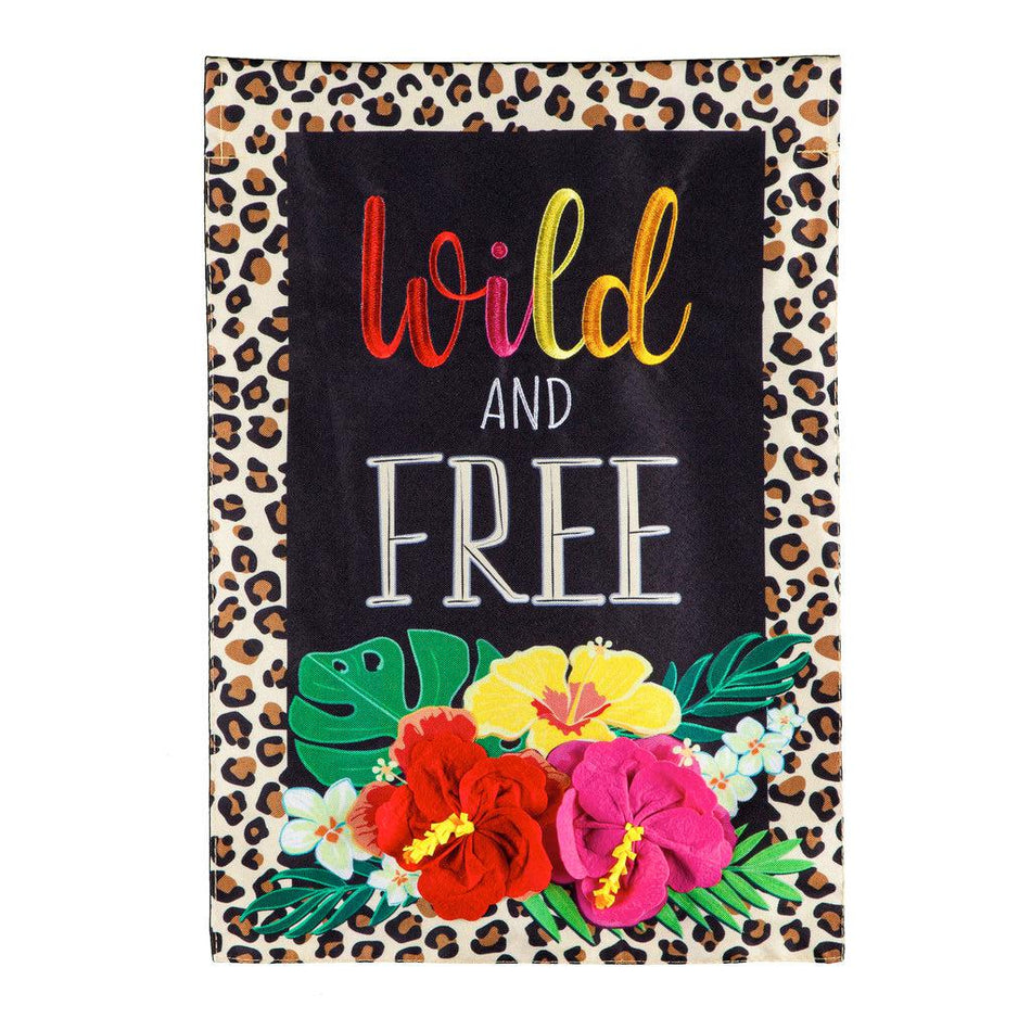 The Wild and Free garden flag features bright flowers, a black background, a border of leopard spots, and the words "Wild and Free".